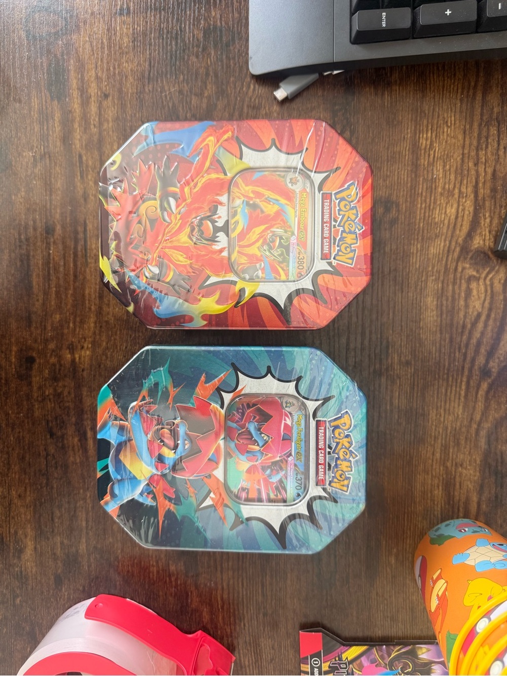 Two ascended hero’s tins (4pk each) mega emboar and fergilator